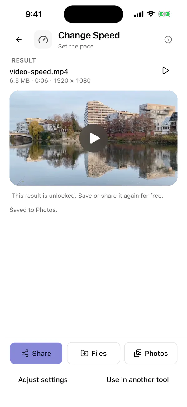 Vauli result screen in the iPhone Simulator for the sample clip at 2×, showing video-speed.mp4 with 6.5 MB · 0:06 · 1920 × 1080, the note that the result is unlocked and was saved to Photos, the Share, Files and Photos buttons, Adjust settings and Use in another tool